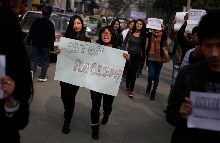 Students march during a protest in New Delhi on February 1, 2014 after the death of Nido Tania.