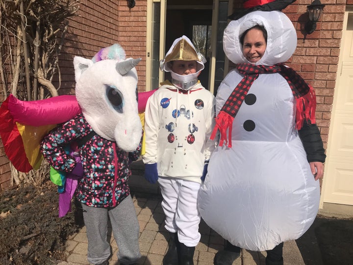 Poppy, Atlas and Kat opt for a change of costume. These regular walks will help Atlas, who is on the autism spectrum, more easily participate in Halloween festivities come October. 