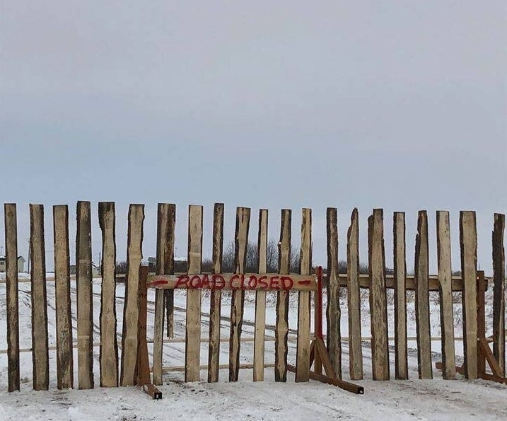 A roadway leading into the Louis Bull First Nation in Maskwacis, Alta. is blocked as strict rules have been implemented to protect its citizens from the coronavirus.