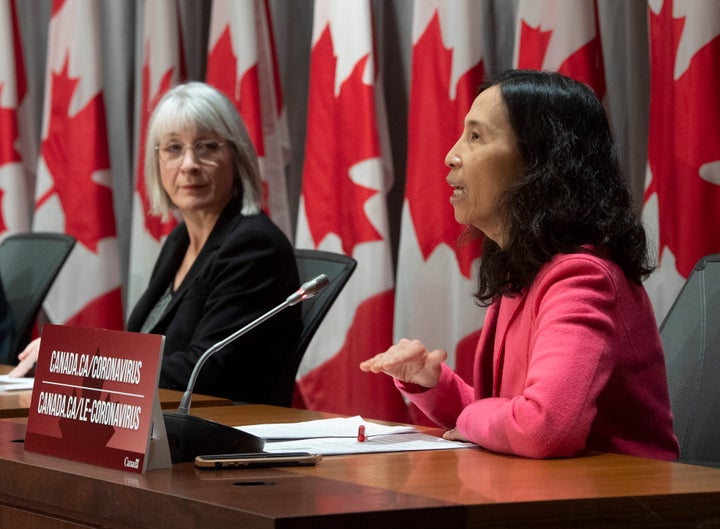 Minister of Health Patty Hajdu looks on as Chief Public Health Officer Theresa Tam responds to a question during a news conference in Ottawa on April 2, 2020. 