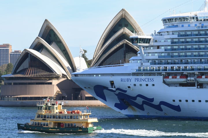 The Ruby Princess cruise ship departs the Overseas Passenger terminal in Circular Quay on March 19, 2020 in Sydney, Australia.