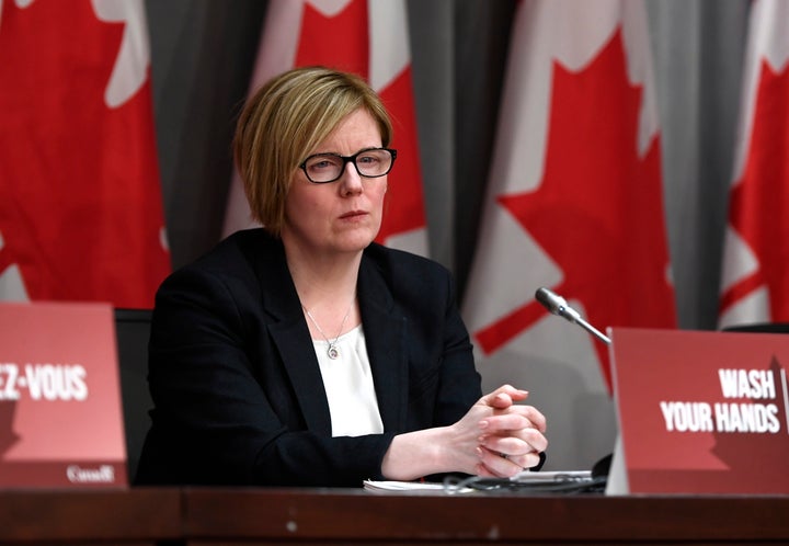 Carla Qualtrough listens during a press conference on COVID-19 at West Block on Parliament Hill in Ottawa on March 25, 2020.