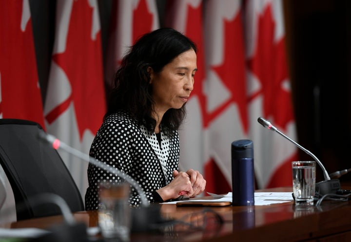 Canada's chief public health officer Dr. Theresa Tam listens to questions at a press conference on COVID-19 on Parliament Hill in Ottawa on March 24, 2020.