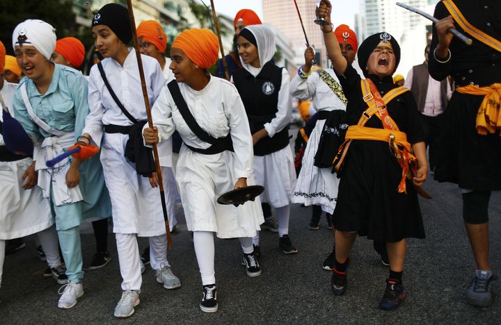 Young Sikhs practice traditional Indian martial arts during an annual parade marking Vaisakhi on April 14, 2019, in Los Angeles.