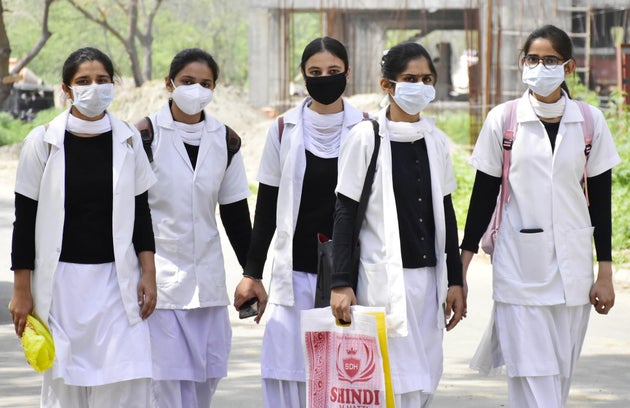 AMRITSAR, INDIA - MARCH 16: Nursing students wearing protective face masks as precaution against coronavirus,...