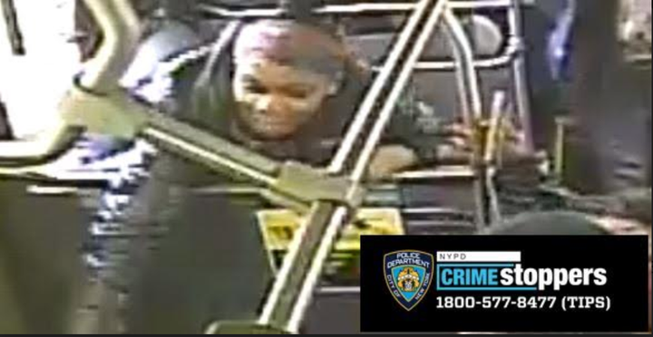 The unidentified female shown here struck the victim with an umbrella, according to police. The NYPD has asked anyone with information regarding the suspect's identity to call 1-800-577-TIPS (8477).