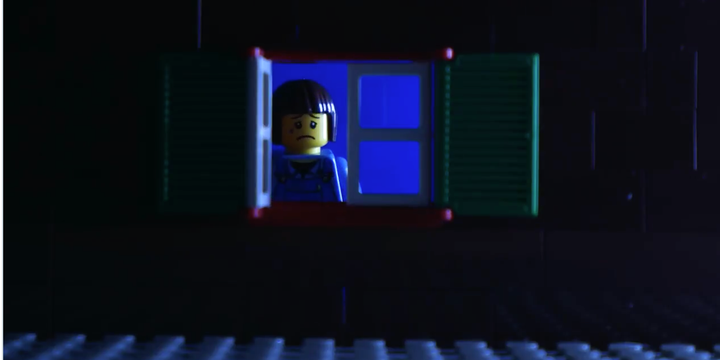 Sad LEGO boy isolated from his plastic playmates during the COVID-19 pandemic