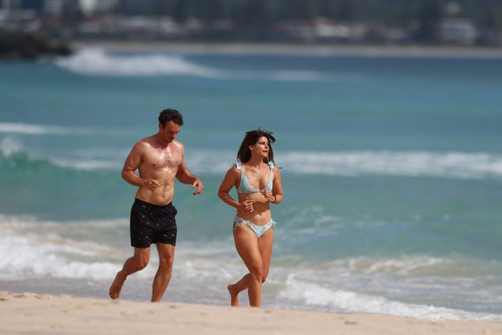People run along Coolangatta beach on April 07, 2020 in Gold Coast, Australia. A number of major Gold Coast beaches will close from midnight on Tuesday over COVID-19 concerns. 