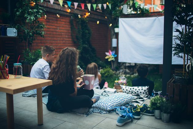 Turn your backyard or porch into a movie night spot.