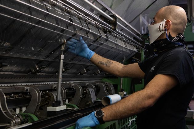 VERANO BRIANZA, ITALY - MARCH 25: A man checks a chassis as he works inside the Cifra production plant...