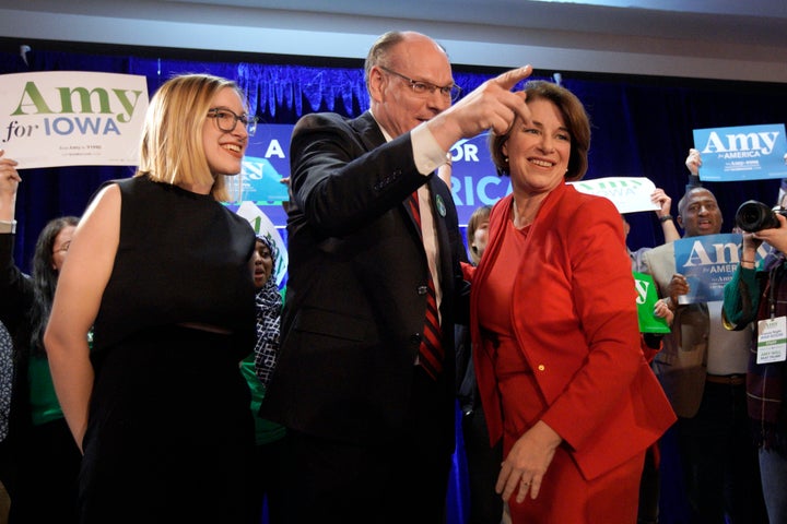 Sen. Amy Klobuchar, D-Minn., stands with her husband, John Bessler, and daughter Abigail Klobuchar Bessler, left, in February.