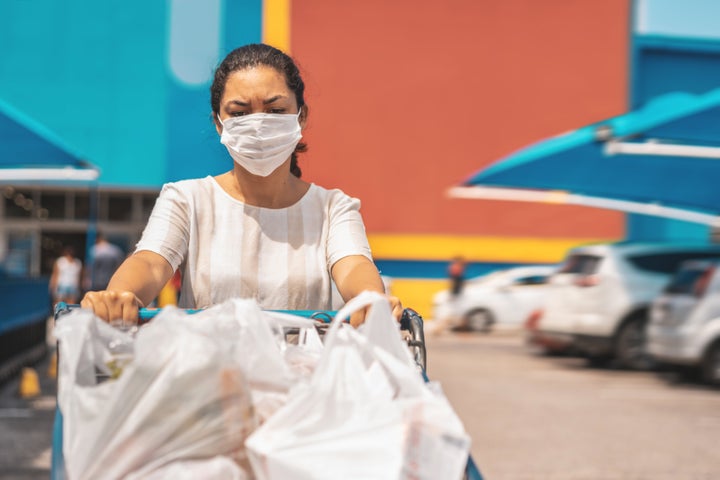 Grocery delivery workers are braving the market for those who can't or don't want to leave their homes during the pandemic.