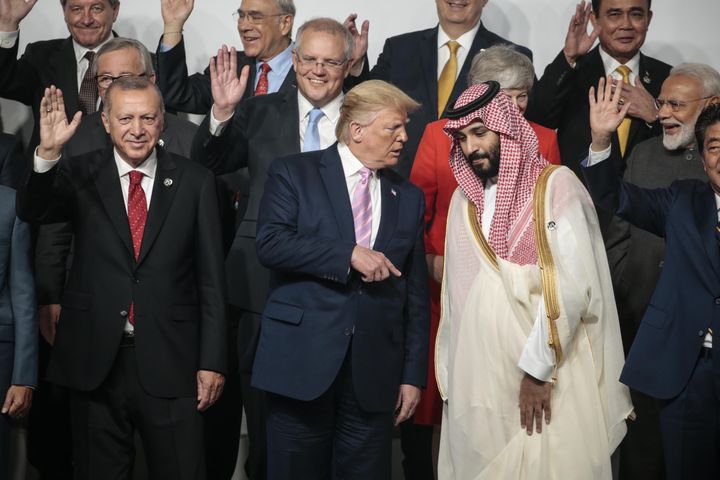 U.S. President Donald Trump speaks with Saudi Crown Prince Mohammad Bin Salman on the first day of the G20 summit in Osaka, Japan, in June 2019.