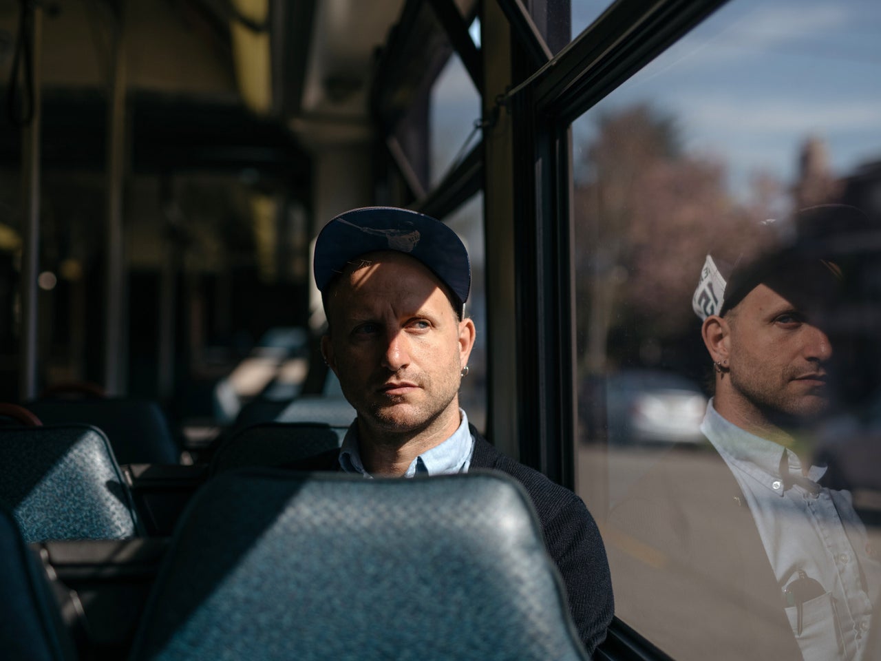 King County Metro bus driver Sam Smith says his routes are quieter and take less time, but there are still far too many people riding for him to feel safe.