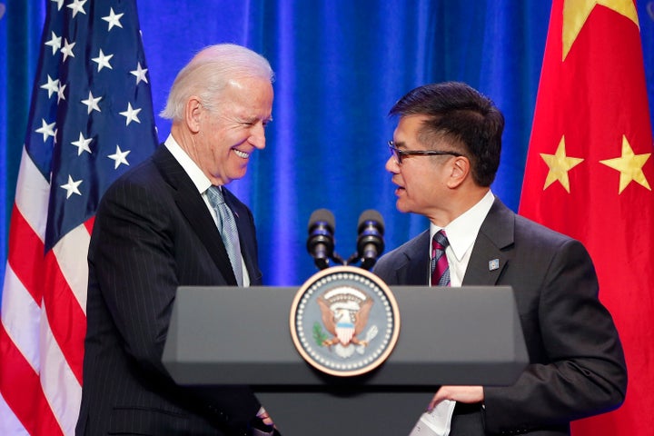 Joe Biden (left) with Gary Locke (right) in Beijing in 2013.