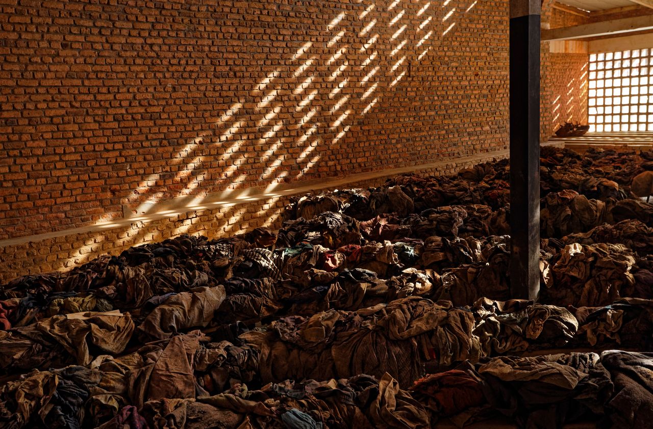 Piles of clothes belonging to victims who sought refuge inside a church, as a memorial to the hundreds of thousands who were killed during the 1994 genocide in Rwanda. 