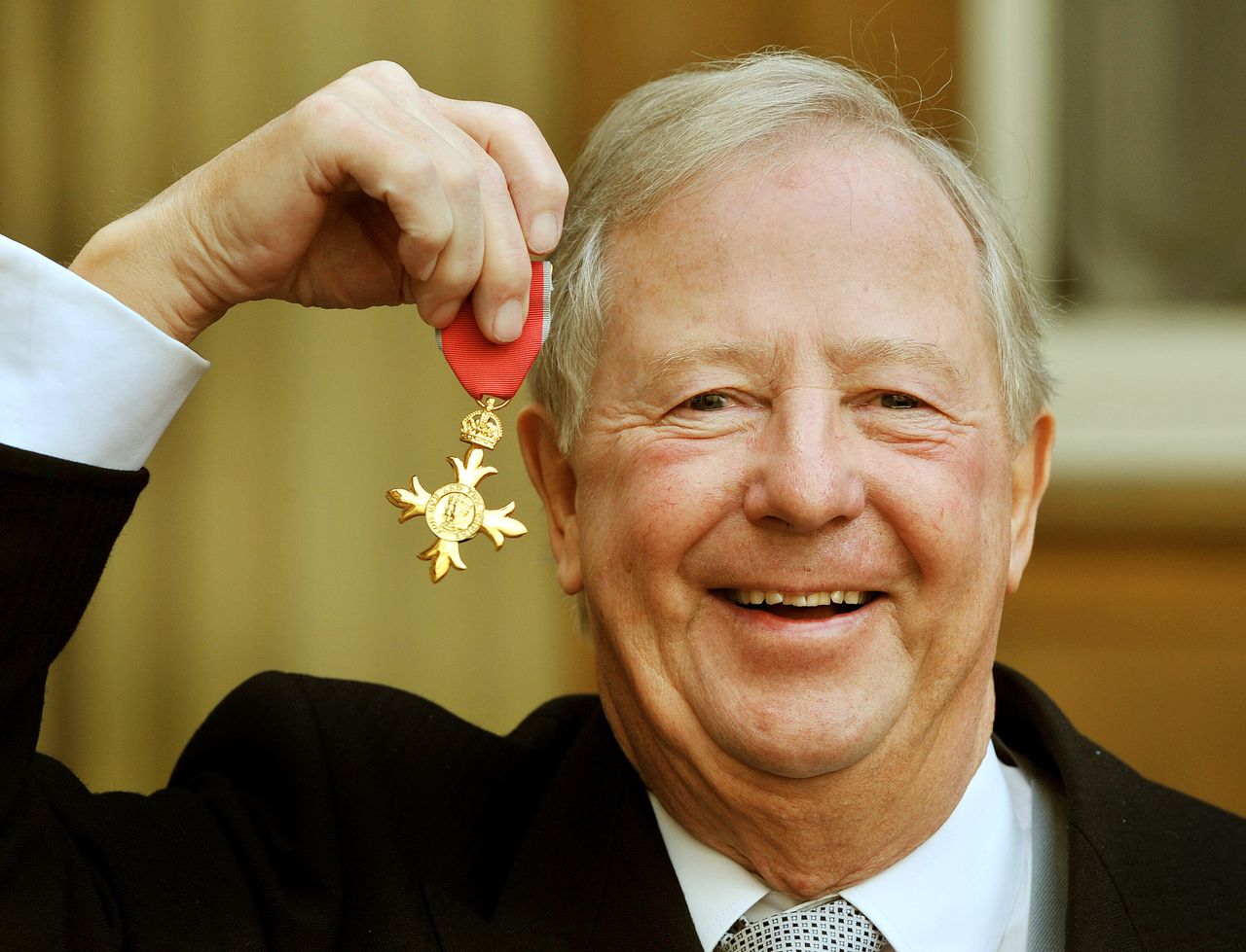 Tim Brooke-Taylor after being awarded an OBE ini 2011. 