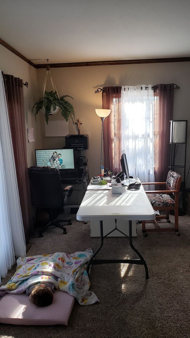 Accounting clerk Molly Lisenko brought in a six-foot folding table to accommodate her new work and schooling situation. 