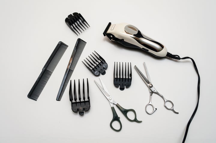 Hair clippers, scissors and assorted guards. 