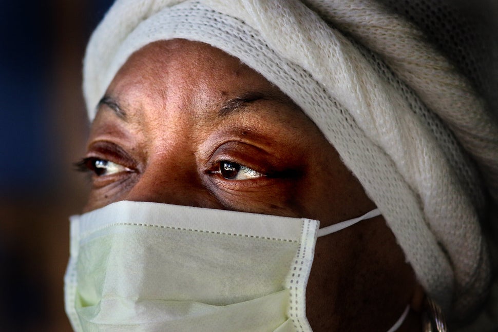 Personal care assistant Maria Colville leaves for work from Cambridge, Massachusetts, to care for a woman on March 26, 2020.&