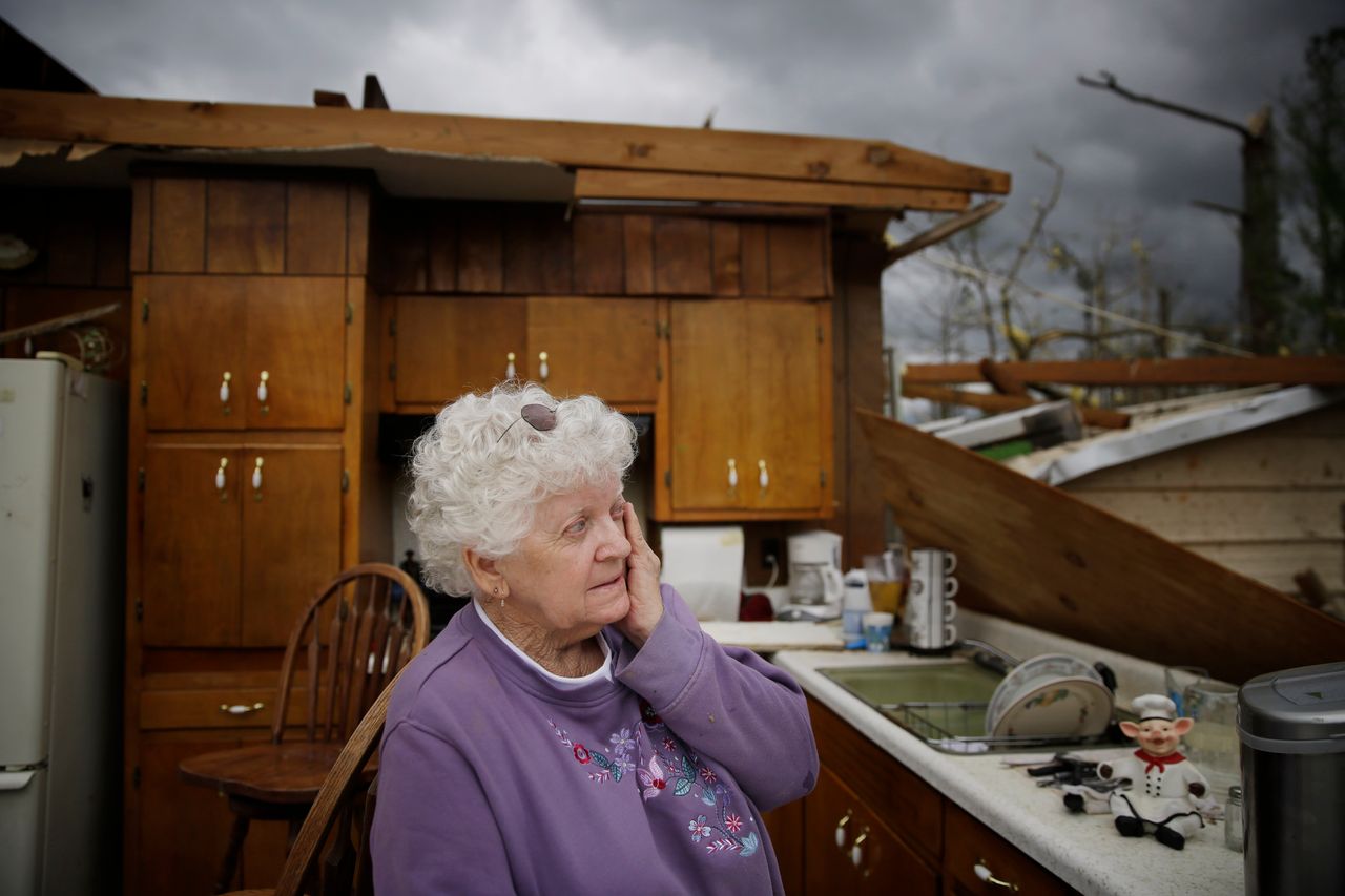 Emma Pritchett in her roofless kitchen on April 13, 2020, the day after a tornado hit, in Chatsworth, Georgia. 