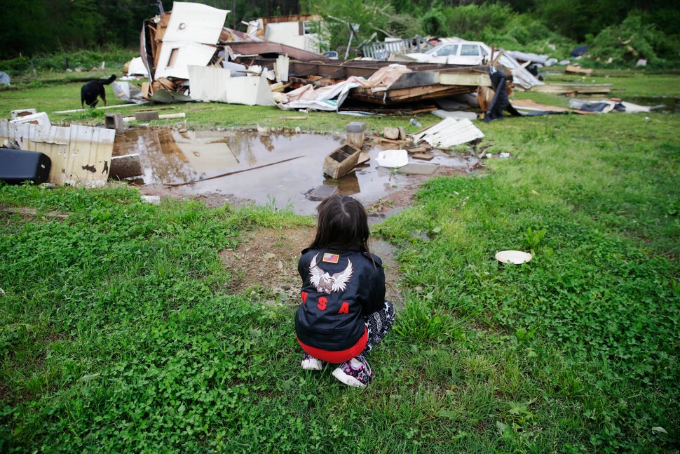 Sky Kriner, 5, looks on after a tornado hit in Chatsworth, Georgia.&nbsp;