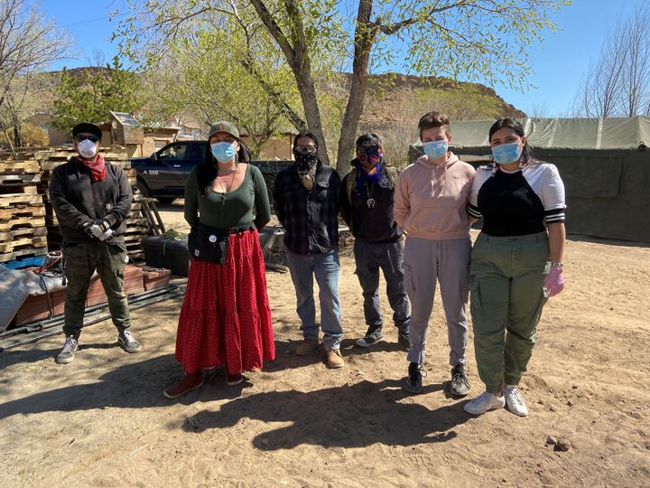 Relief workers pose at a farm used as a base for aid to Navajo families quarantined in their homes due to COVID-19 in Hogback, Shiprock, New Mexico, on April 7.