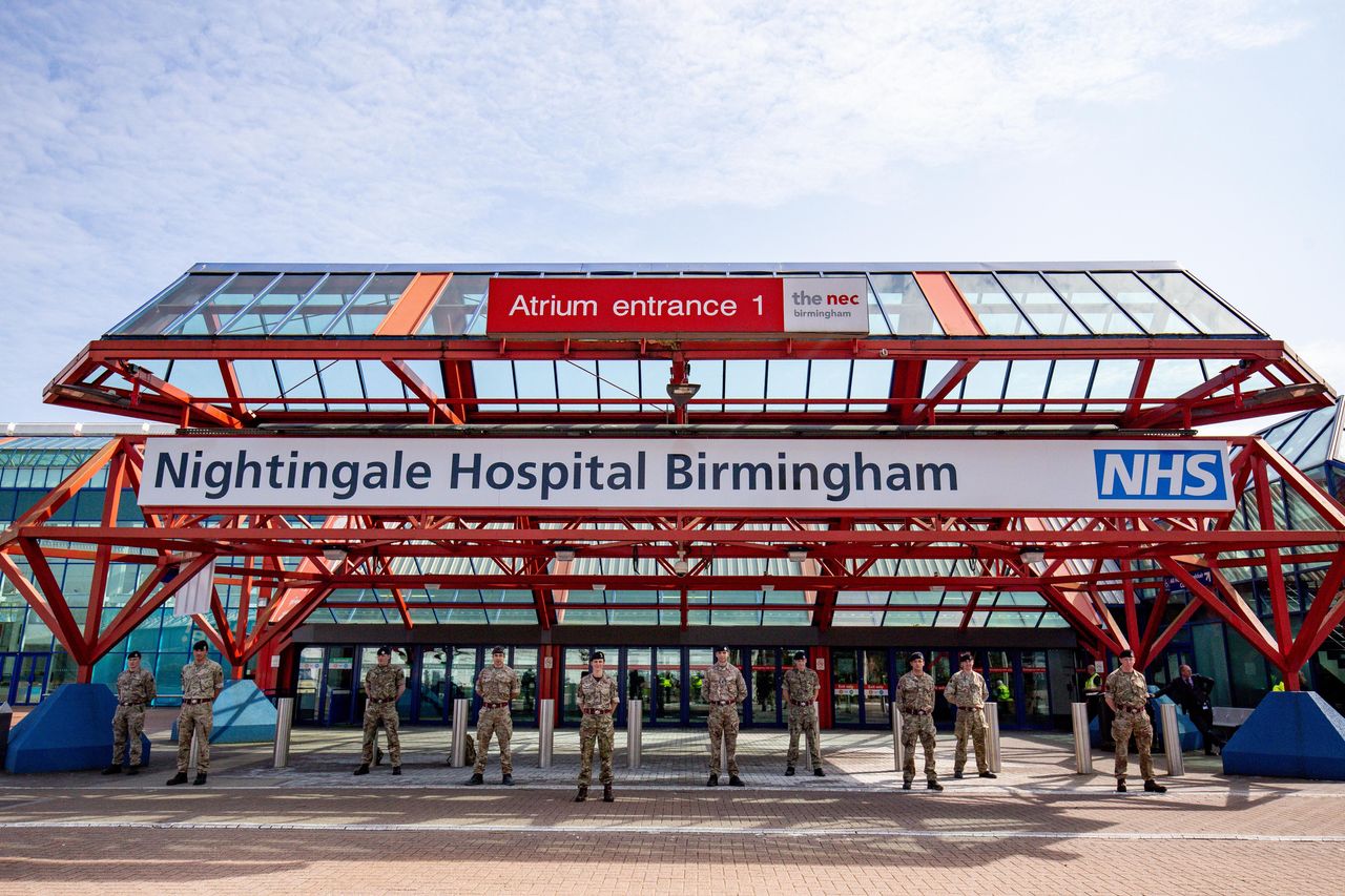 Military personnel at the new temporary NHS Nightingale Birmingham Hospital at the NEC in Birmingham, which is being built to provide care for an increased number of patients requiring treatment during the COVID-19 pandemic.