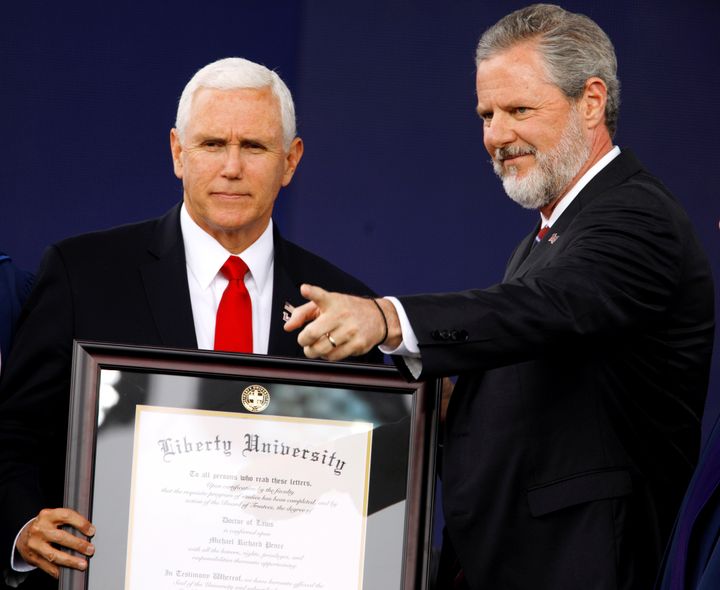 Liberty University President Jerry Falwell Jr. is a loyal supporter of President Donald Trump's administration. Here, he presents an honorary degree to Vice President Mike Pence in Lynchburg, Virginia, U.S., on May 11, 2019. 