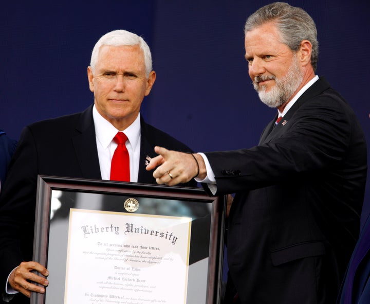 Liberty University President Jerry Falwell Jr. is a loyal supporter of President Donald Trump's administration. Here, he presents an honorary degree to Vice President Mike Pence in Lynchburg, Virginia, U.S., on May 11, 2019.