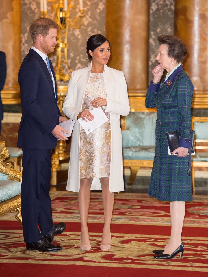 The Duke and Duchess of Sussex and Princess Anne attend a reception to mark the 50yh anniversary of the investiture of the Prince of Wales -- Anne's brother -- at Buckingham Palace on March 5, 2019.