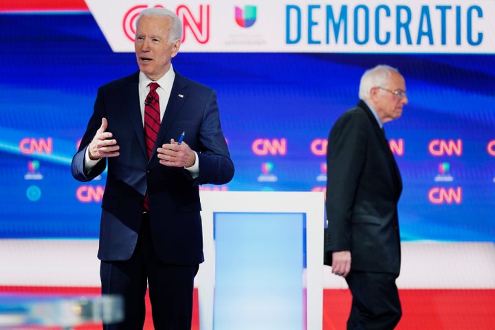 Former Vice President Joe Biden prepares for a Democratic presidential primary debate with Sen. Bernie Sanders (I-Vt.) at CNN