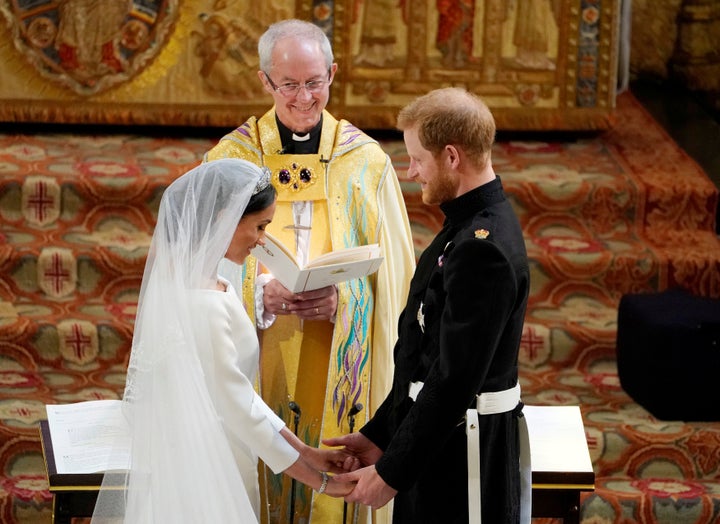 Prince Harry and Meghan Markle exchange vows in St George's Chapel at Windsor Castle during their wedding service, conducted by the Archbishop of Canterbury Justin Welby, on May 19, 2018. 