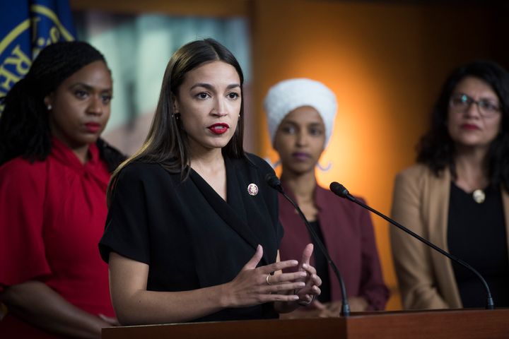 Rep.&nbsp;Alexandria Ocasio-Cortez (D-N.Y.) speaks in July as fellow Squad members and Democratic Reps. Ayanna Pressley (Mass