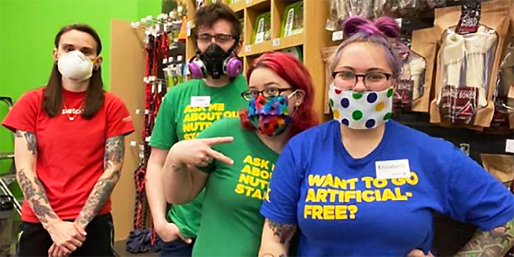 Several photos that Petco used in a company bulletin to highlight its safety measures showed employees standing less than 6 f
