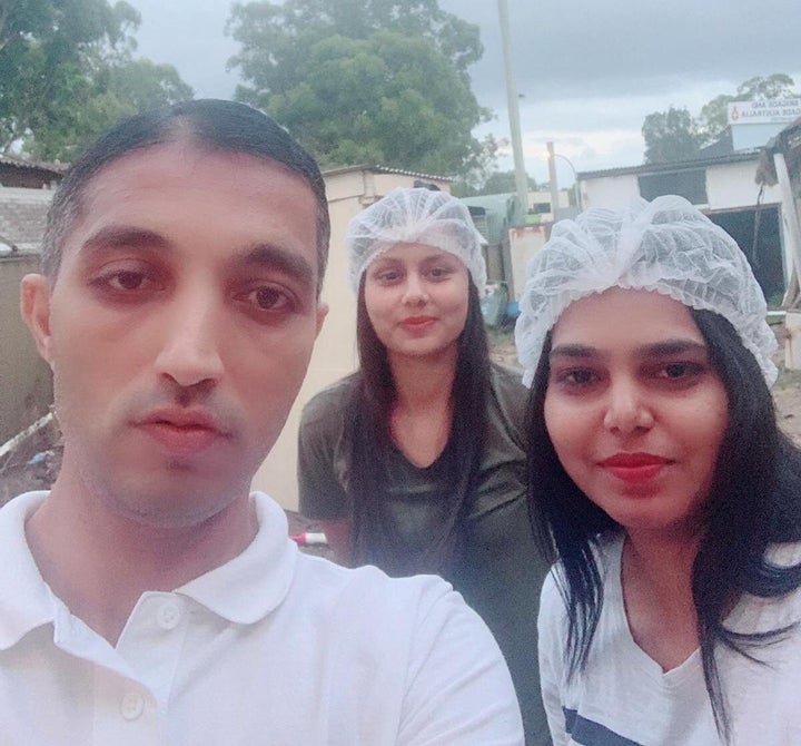 Chowpati restaurant owner Vatsal Harshadkumar Shah, left, with two staff members. The restaurant offers free meals for struggling international students.