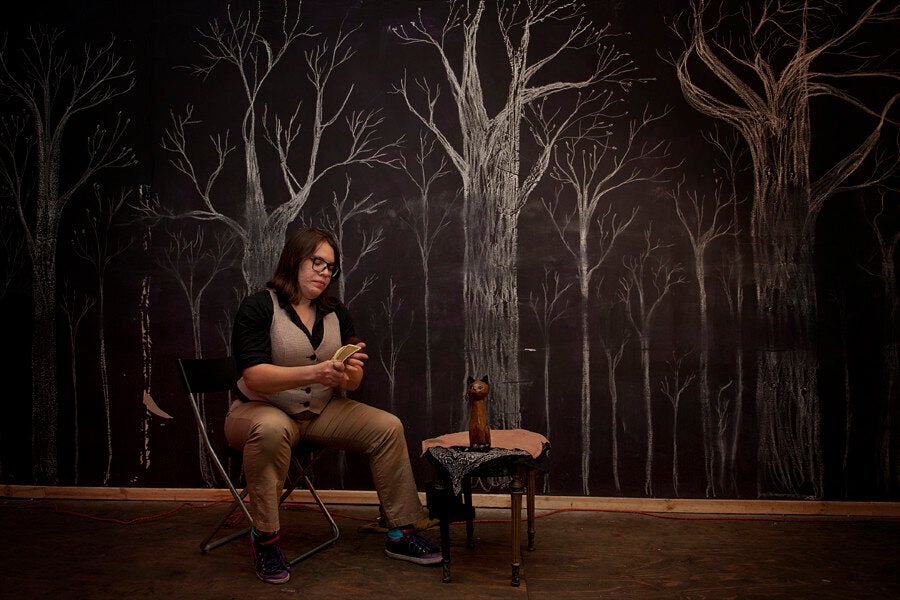 <div class="feature-caption"><em>Stella begins a reading at Catland in Bushwick, Brooklyn. (Wendy George/Huffington Post)</em></div>