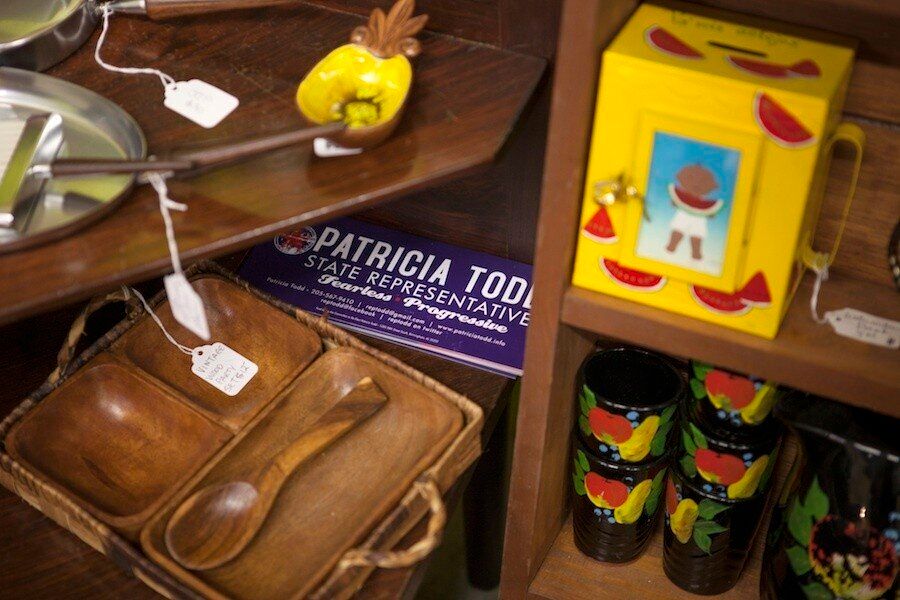 Patricia Todd bumper stickers are displayed on a shelf in a consignment shop in Birmingham. (Photo by Cary Norton)