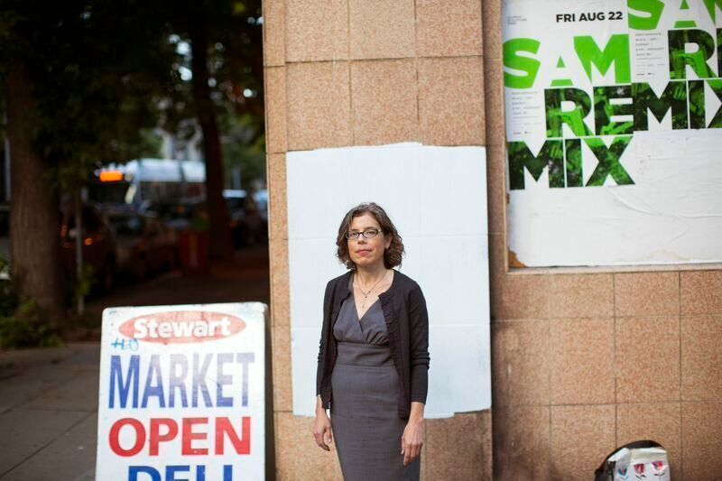 Lisa Daugaard, a public defender who pushed the Seattle Police Department to reform its drug policies, stands for a portrait in downtown Seattle on Wednesday, Aug. 13, 2014. Mike Kane for The Huffington Post
