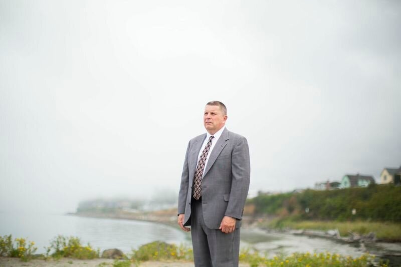 <em>Former Seattle Police Department Commander Steve Brown stands for a portrait near his home in Edmonds, Wash., on Friday, 