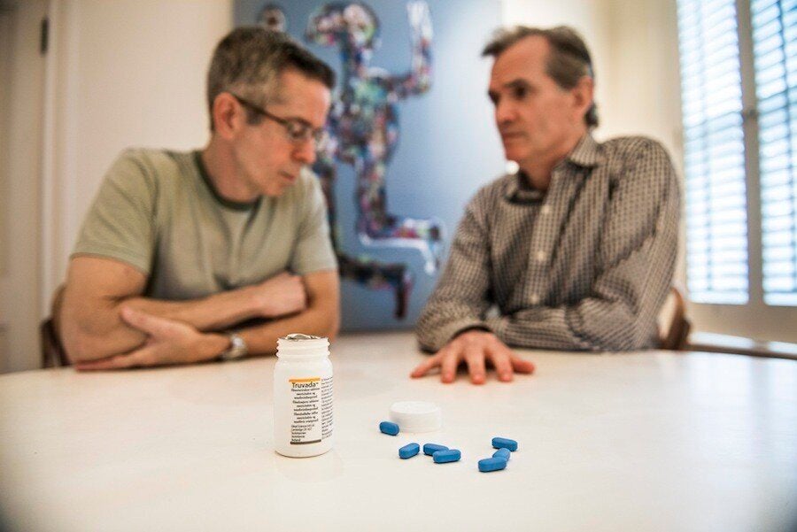 <em>Longtime friends Peter Staley, left, and Sean Strub pose for a portrait in Strub's home in Milford, Pennsylvania. Truvada