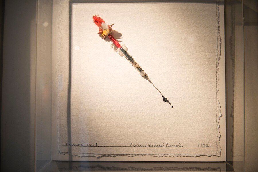 The "poison dart" by artist Barton Benes. The piece is a hypodermic needle with Strub's blood splurging out of it. "[It] required me to get my doctor to let me leave his office with a vial of blood, which wasn't easy," Strub said. "I eventually talked the phlebotomist into drawing an extra vial and I snuck it out of the office." (Photo by Damon Dahlen)