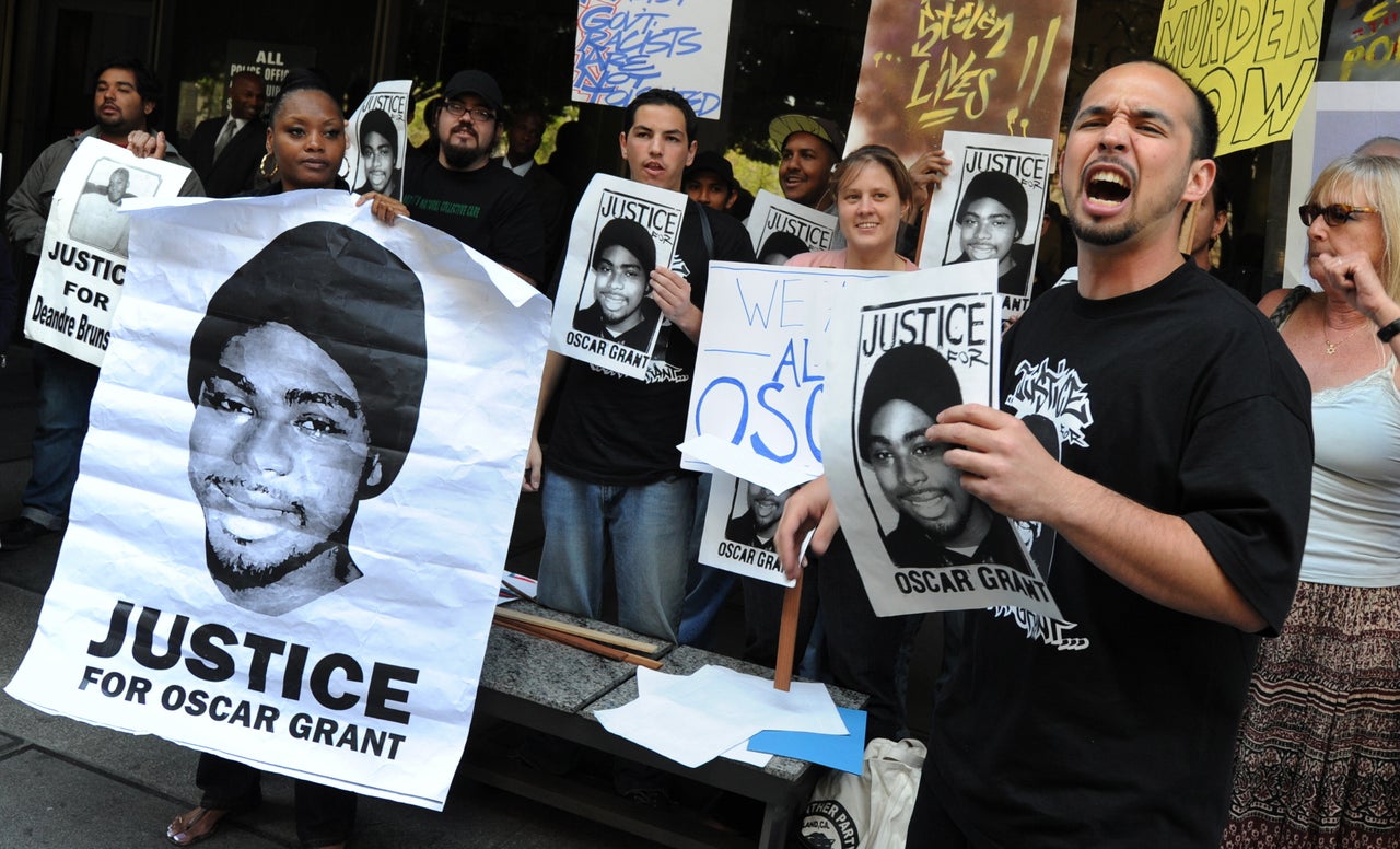 A protest rally outside a pretrial hearing for Johannes Mehserle, the former Bay Area Rapid Transit officer charged with murder in the shooting death of Oscar Grant in Oakland, California, March 26, 2010. (MARK RALSTON/AFP/Getty Images)