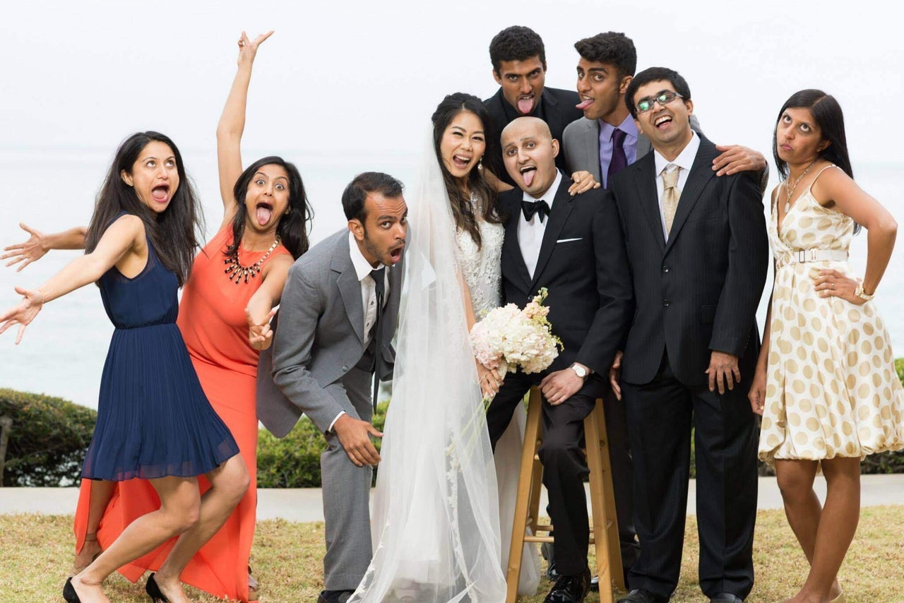 <em>Shah and Chen goof around with family at their wedding in April 2015.</em>
