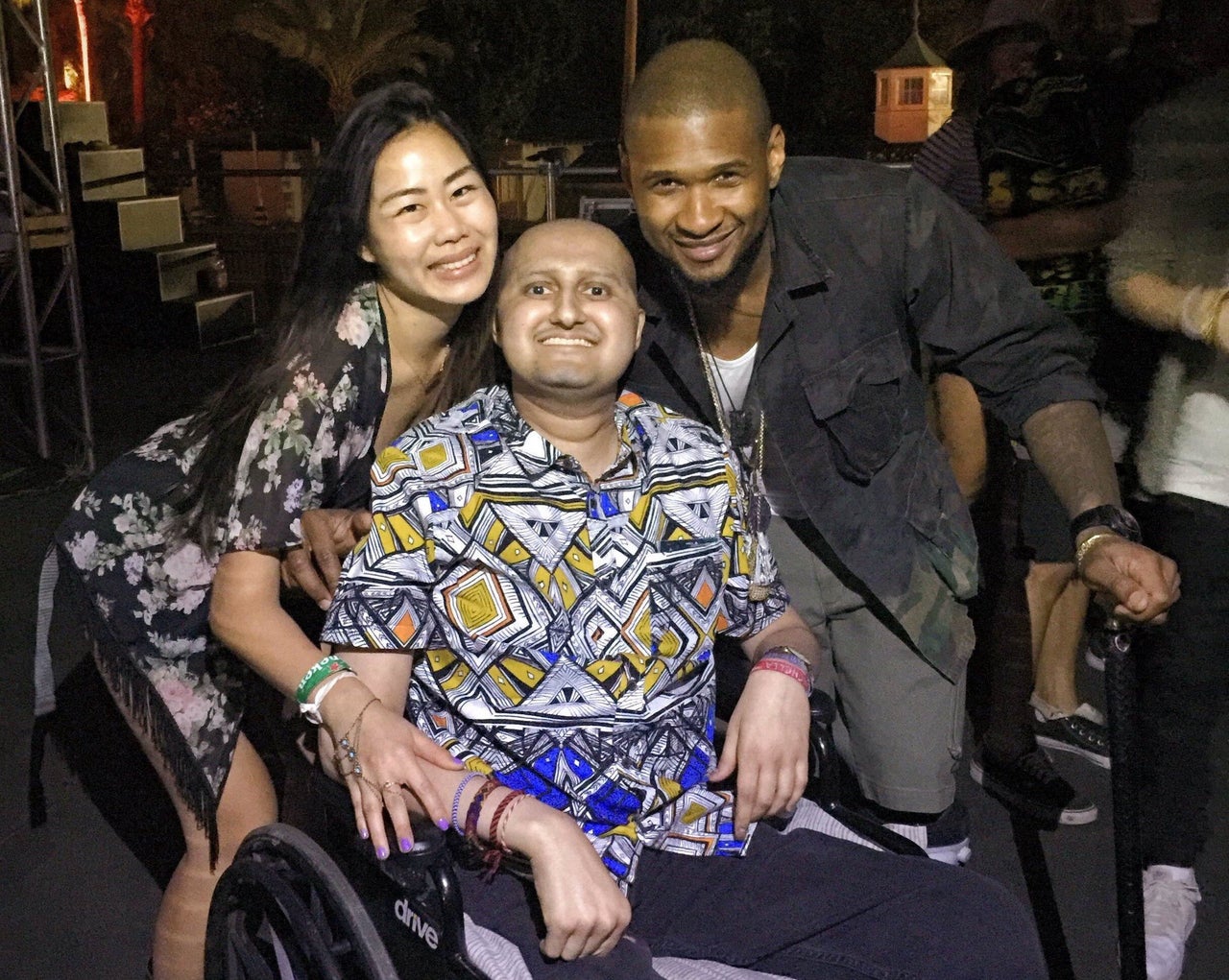 Shah and Chen meet Usher at the Coachella music festival in April 2015.