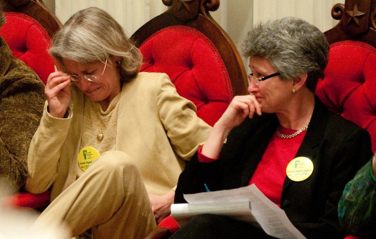 <em>Beth Robinson and Susan Murray on April 7, 2009, moments after the Vermont legislature voted to override Gov. Jim Douglas' veto. (Floating World Pictures)</em>