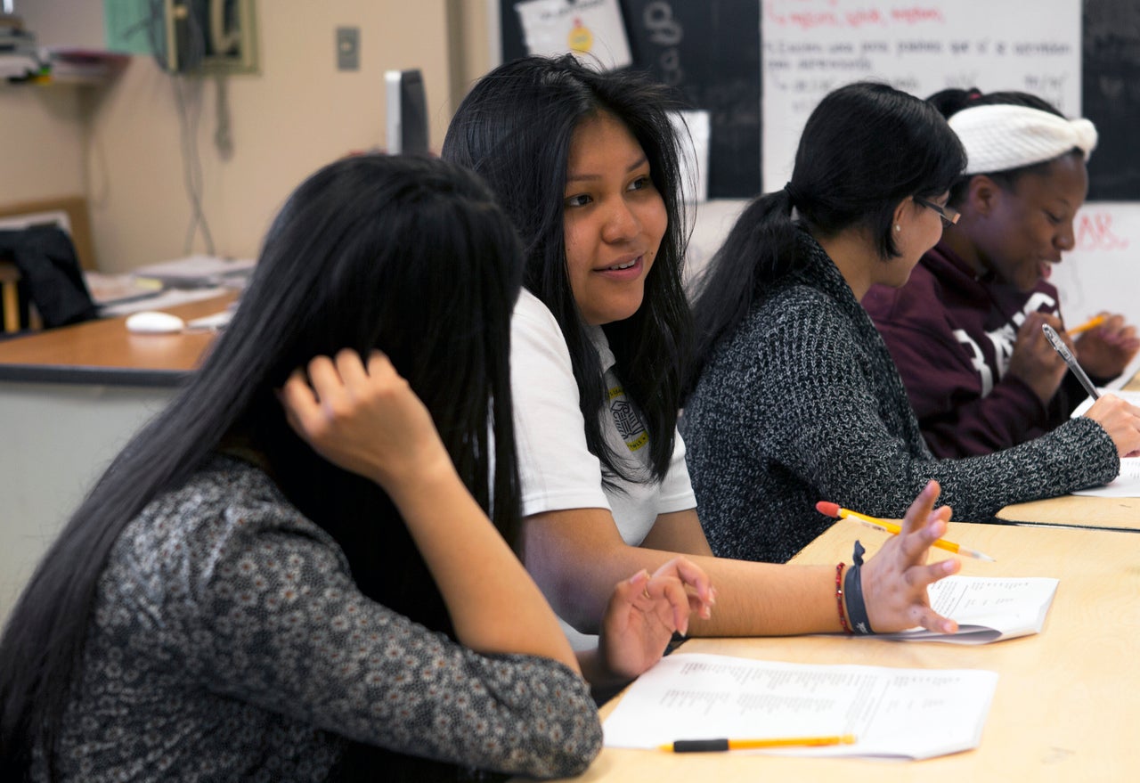 <em>Mentees and mentors talk during an after-school L.O.V.E. meet-up.</em>
