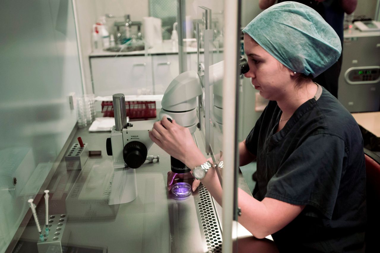 An embryologist works on embryo at the Create Health fertility clinic in south London.