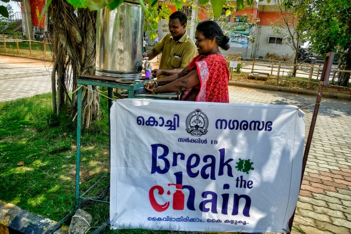 People are seen washing their hands as a precaution against the spread of Coronavirus in Kochi.