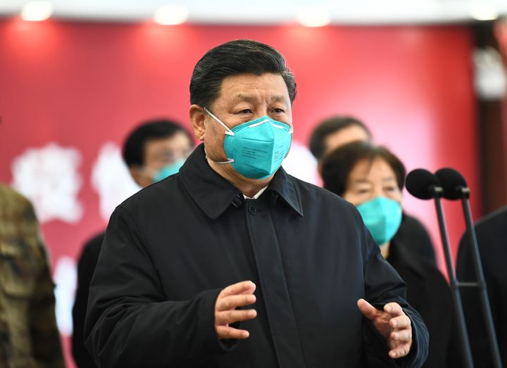 Chinese President Xi Jinping talks by video with patients and medical workers at the Huoshenshan Hospital in Wuhan in central China's Hubei Province, 